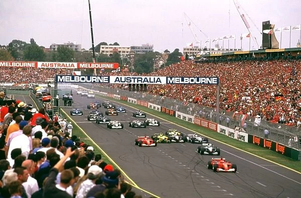 Albert Park, Melbourne, Australia. 3 March 2001: Michael Schumacher leads at the start as the Jordan Honda of Heinz Harald Frentzen and David