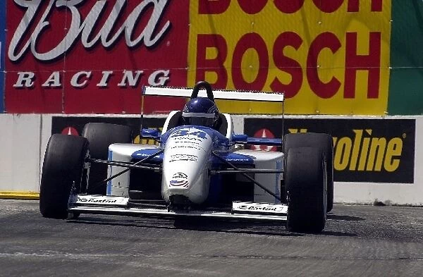Alex Gurney led a number of laps early on, only to be passed on a restart by eventual winner Michael Valiante at the Chevron Challenge Atlantic race at Long Beach, Ca. Toyota Grand Prix of Long Beach. Long Beach, Ca. 14 April, 2002