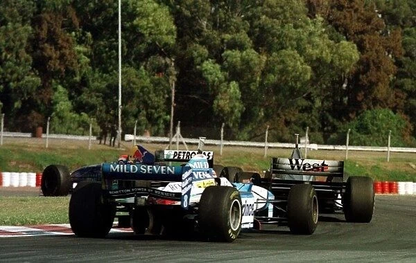 ARGGP10.JPG. 1997 ARGENTINIAN GP.. Johnny Herbert leads Mika Hakkinen
