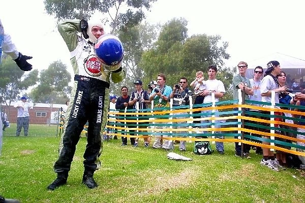 Australian GP: Jacques Villeneuve walks away from his car after a huge accident with Ralf Schumacher