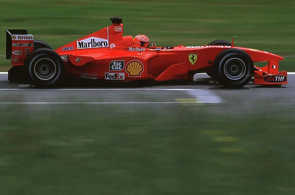 Austrian Grand Prix A1 Ring, Austria 14-16th July 2000 Michael Schumacher in the Ferrari-side action World Copyright LAT Format: 35mm transparency