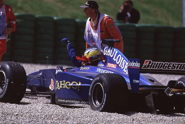 Austrian Grand Prix A1 Ring, Austria 14-16th July 2000 Nick Heidfeld has a shunt with team mate and goes off into the gravel in the Prost World Copyright LAT Format: 35mm transparency