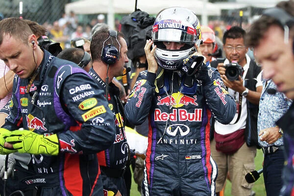 Autodromo Nazionale di Monza, Monza, Italy. 8th September 2013. Sebastian Vettel, Red Bull Racing, arrives on the grid. World Copyright: Andy Hone / LAT Photographic. ref: Digital Image HONY6885