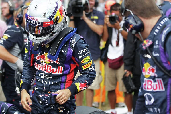 Autodromo Nazionale di Monza, Monza, Italy. 8th September 2013. Sebastian Vettel, Red Bull Racing, arrives on the grid. World Copyright: Andy Hone / LAT Photographic. ref: Digital Image HONY6876