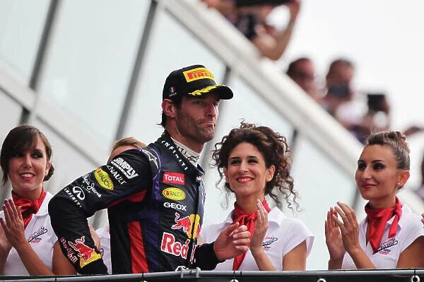 Autodromo Nazionale di Monza, Monza, Italy. 8th September 2013. Mark Webber, Red Bull Racing, 3rd position, arrives on the podium. World Copyright: Andy Hone / LAT Photographic. ref: Digital Image HONY8139