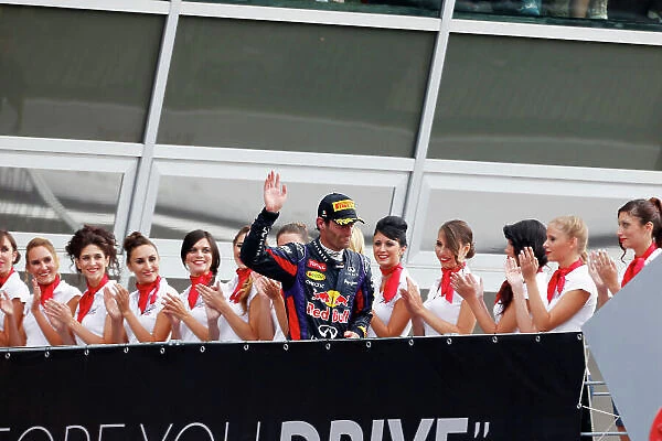 Autodromo Nazionale di Monza, Monza, Italy. 8th September 2013. Mark Webber, Red Bull Racing, 3rd position, arrives on the podium. World Copyright: Charles Coates / LAT Photographic. ref: Digital Image _N7T5572