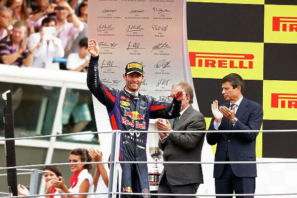 Autodromo Nazionale di Monza, Monza, Italy. 8th September 2013. Mark Webber, Red Bull Racing, 3rd position, arrives on the podium. World Copyright: Charles Coates / LAT Photographic. ref: Digital Image _N7T5575