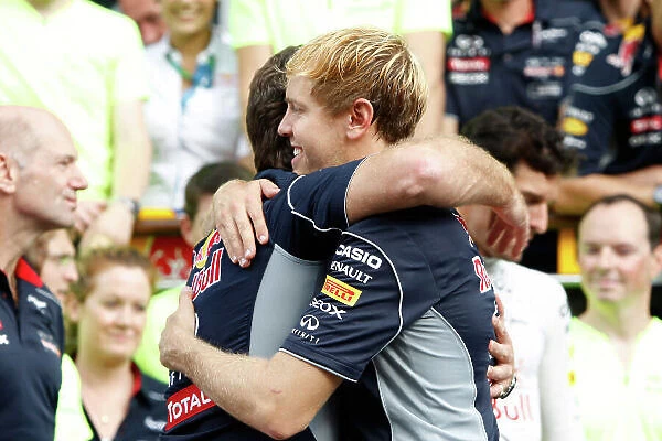 Autodromo Nazionale di Monza, Monza, Italy. 8th September 2013. Sebastian Vettel, Red Bull Racing., 1st position, is congratulated by Christian Horner, Team Principal
