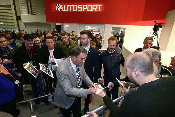 Autosport International Exhibition. National Exhibition Centre, Birmingham, UK. Sunday 14th January 2018. Nigel Mansell signs autographs. World Copyright: Mike Hoyer / JEP / LAT Images Ref: AQ2Y0010