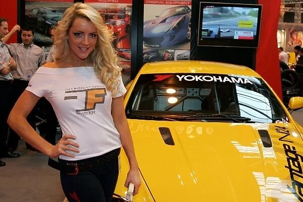 Autosport International Show: A Promo girl with the Aston Martin V8 Vantage Nurburgring 24 Hours car