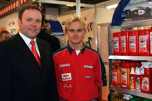 Autosport International Show: SONAX representative with Heikki Kovalainen Arden team driver for the 2005 GP2 Championship with sponsor SONAX