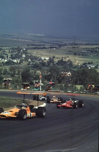 B. McLaren heads C. Amon, J. Love & J. Siffert: South African Grand Prix, Kyalami, 27 Feb-1 Mar 69