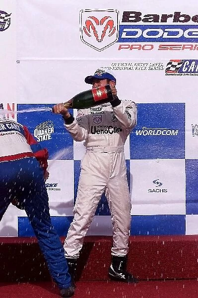 Barber Dodge Championship: Roger Yasukawa celebrates his first victory in the series with the champagne