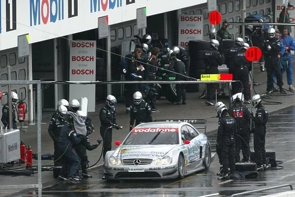 DTM. Bernd Schnider (GER) Mercedes CLK DTM makes a pit stop.