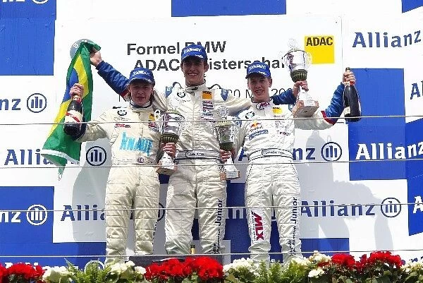 BMW Formula ADAC: The podium: Dominik Jackson Muecke Motorsport, second; Atila Abreu winner; Sebastian Vettel Eifelland Racing, third