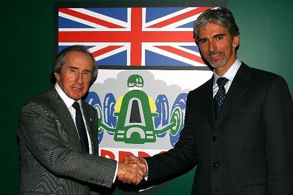 BRDC Silverstone Meeting: Outgoing president of the BRDC, Sir Jackie Stewart with newly elected president of the BRDC, Damon Hill