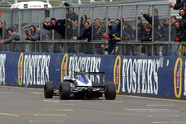 British Formula 3 Championship: Robbie Kerr crosses the line and wins to the delight of his team