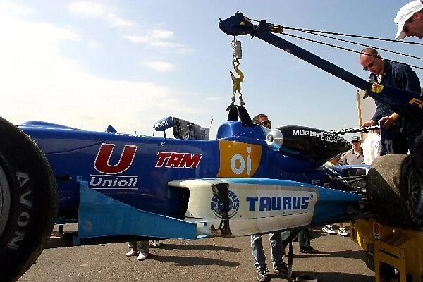 British Formula Three Championship: The damaged car of Nelson Piquet Jnr Piquet Sports is brought back to the pits