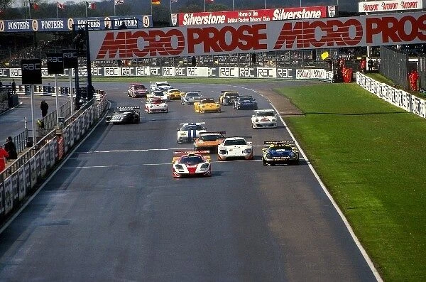 British GT Championship: Steve O Rourke EMKA Racing McLaren F1 GTR leads the field at the rolling start, whilst Julian Bailey recovers