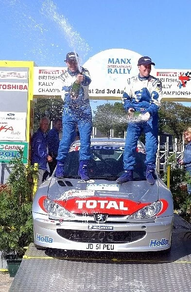 British Rally Championship: Justin Dale and Andrew Bargery spray the champagne