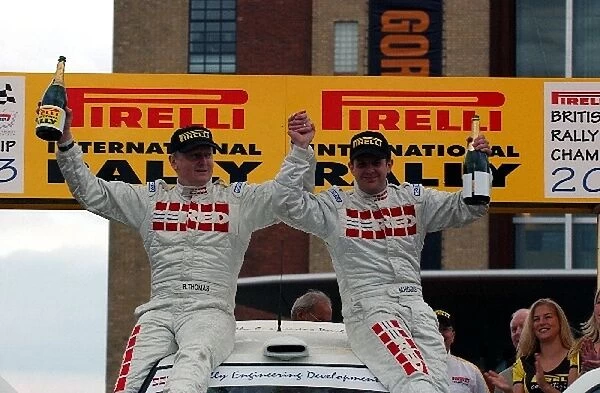 British Rally Championship: Mark Higgins and Bryan Thomas celebrate on their car