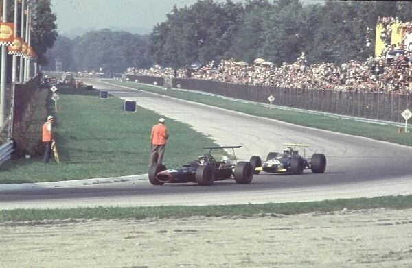 BRM P126 of Piers Courage leads Brabham Bt26 of Brabham Italian Grand Prix