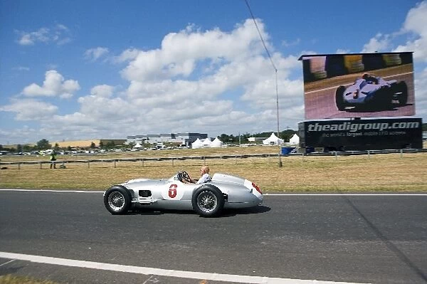 Brooklands Double Twelve Festival: Sir Stirling Moss, demonstrates a historic Mercedes-Benz W196 racing car