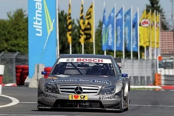 DTM. Bruno Spengler (CDN), Mercedes-Benz Bank AMG C-Klasse (2009).