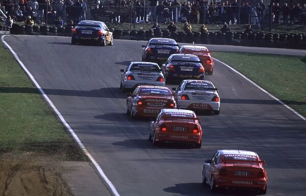 BTCC Brands - Menu leads pack: Alain Menu leads the pack on his way to victory in the first race