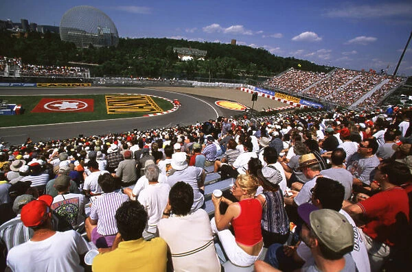 CANADIAN GRAND PRIX 2000 The crowd watch on as their heroes speed around