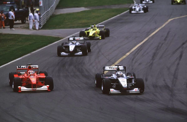 CANADIAN GRAND PRIX 2000 David Coulthard, McLaren Mercedes leads Rubens Barrichello