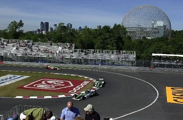 CART competitors navigate the hairpin at the Molson Indy Montreal. Circuit Gilles Villeneuve