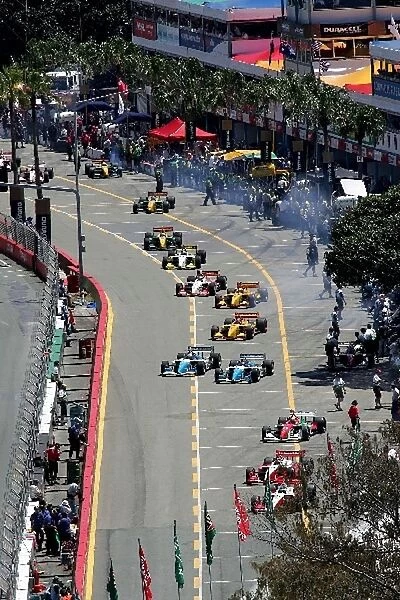 Champ Car World Series: The champ cars blast out of the pits onto the Surfers Paradise street circuit