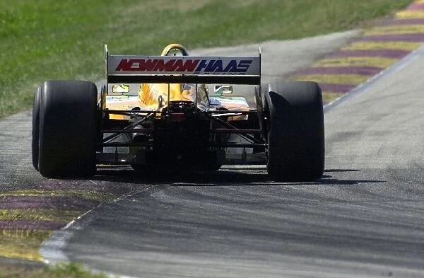 Christian Fittipaldi, (BRA), Toyota / Lola, barely keeps it on the racing surface during practice for the Motorola 220 at Road America. Road America, Elkhart Lake, Wi. 16