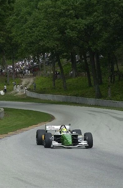 Christian Fittipaldi winds through Thunder Valley at the Motorola 220 at Road America