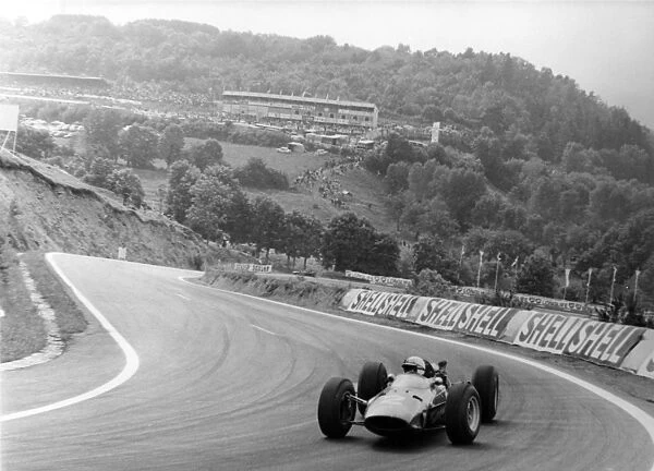 Clermont-Ferrand, France. 27 June 1965: John Surtees, Ferrari 158, 3rd position, action