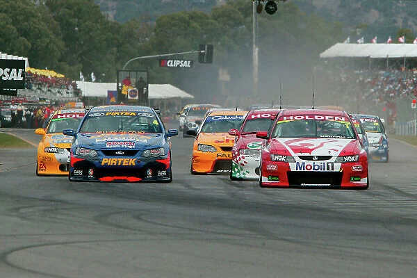 Clipsal 500 V8 Supercars Adelaide 22nd March 2003 Mark Skaife (right) and Marcos Ambrose head for turn 1 at the start of race 2 of the Clipsal 500 in Adelaide Australia. World Copyright: Mark Horsburgh / LAT Photographic ref: Digital Image Only