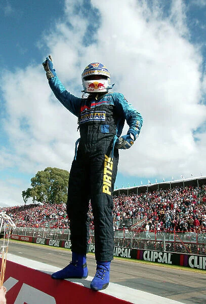 Clipsal 500 V8 Supercars Adelaide 22nd March 2003 Ford driver Marcos Ambrose waves to the crowd after taking victory in race 1 of the 2003 V8 Supercar Championship. World Copyright: Mark Horsburgh / LAT Photographic ref: Digital Image Only