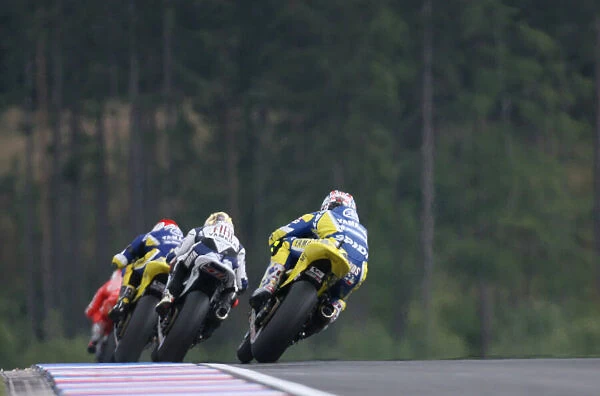 Colin Edwards chases Jorge Lorenzo and Tech 3 Team Mate James Toseland