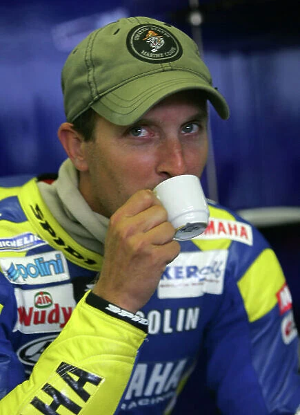 Colin Edwards Tech 3 Yamaha takes an espresso before putting his helmet