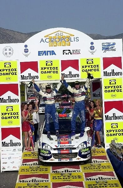 Colin McRae celebrates on the podium: World Rally Championship, Acropolis Rally, 14-17 June 2001