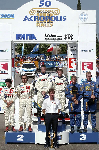 The top three crews on the podium, Acropolis Rally 2003. Photo: McKlein / LAT