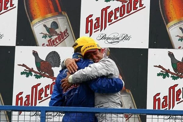 DTM. A delighted Jean Alesi (FRA) AMG-Mercedes hugs 3rd placed, Mattias Ekstrom 