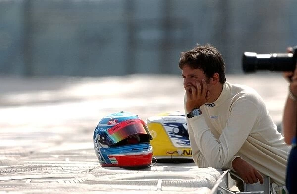 A dissapointed Daniel La Rosa (GER), MB Racing Performance, Dallara-Opel waits for the end of the race behind the guardrail. F3 Euro Series, Rd 11&12, N├╝rburgring, Germany. 16 August 2003