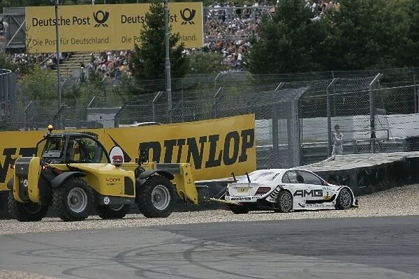 DTM: The car of Paul Di Resta AMG Mercedes C-Klasse, is dragged free after retiring