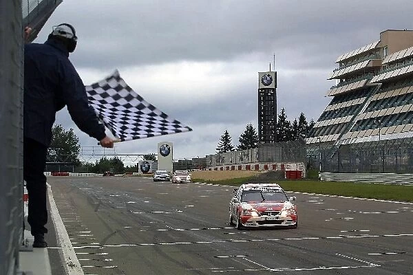 European Super Touring Championship: Fabrice Walfisch passes the flag to win the race