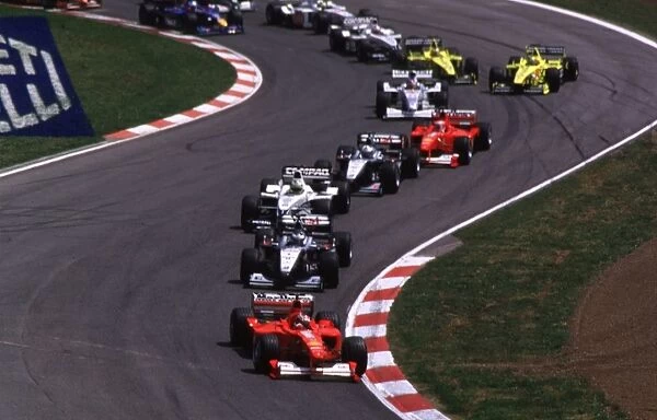 F1Spanish Grand Prix-Ferrari-Schumacher leads-Action Shot: Michael Schumacher-Ferrari-Schumacher in the lead