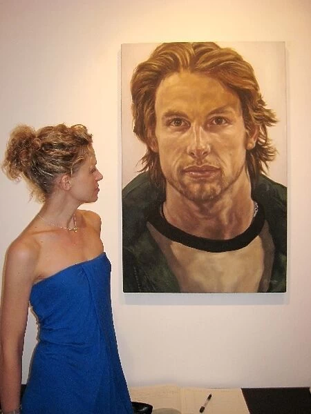 The Face of F1 by Jill Bradley: Jill Bradley, artist, with a portrait of Jenson Button