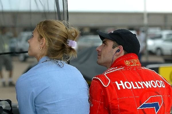 Felipe Giaffone (FRA) and his girlfriend watch the times of the other drivers during practice for the Radisson