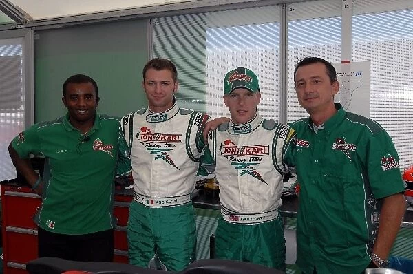 FIA-CIK Karting World Championship: Marco Ardigo, centre left, and Gary Catt, centre right, with their Tony Kart mechanics